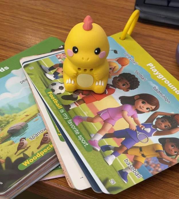 Interactive yellow dinosaur toy with flashcards for toddler learning and vocabulary development